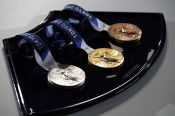 Самая золотая, самая крупная и самая тяжелая. История олимпийских медалей