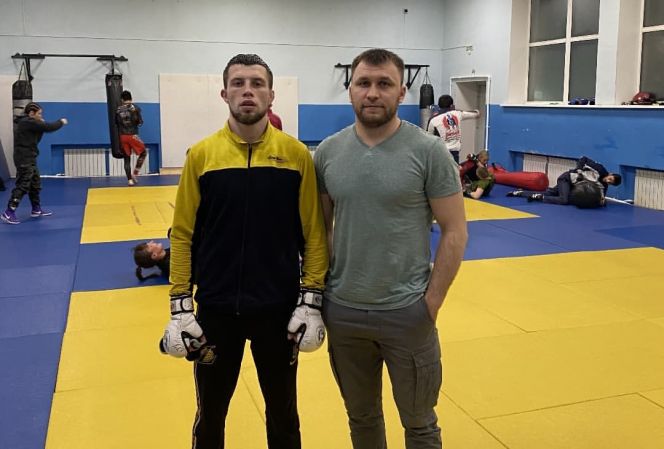 Рустам Негматов с тренером Денисом Канаковым