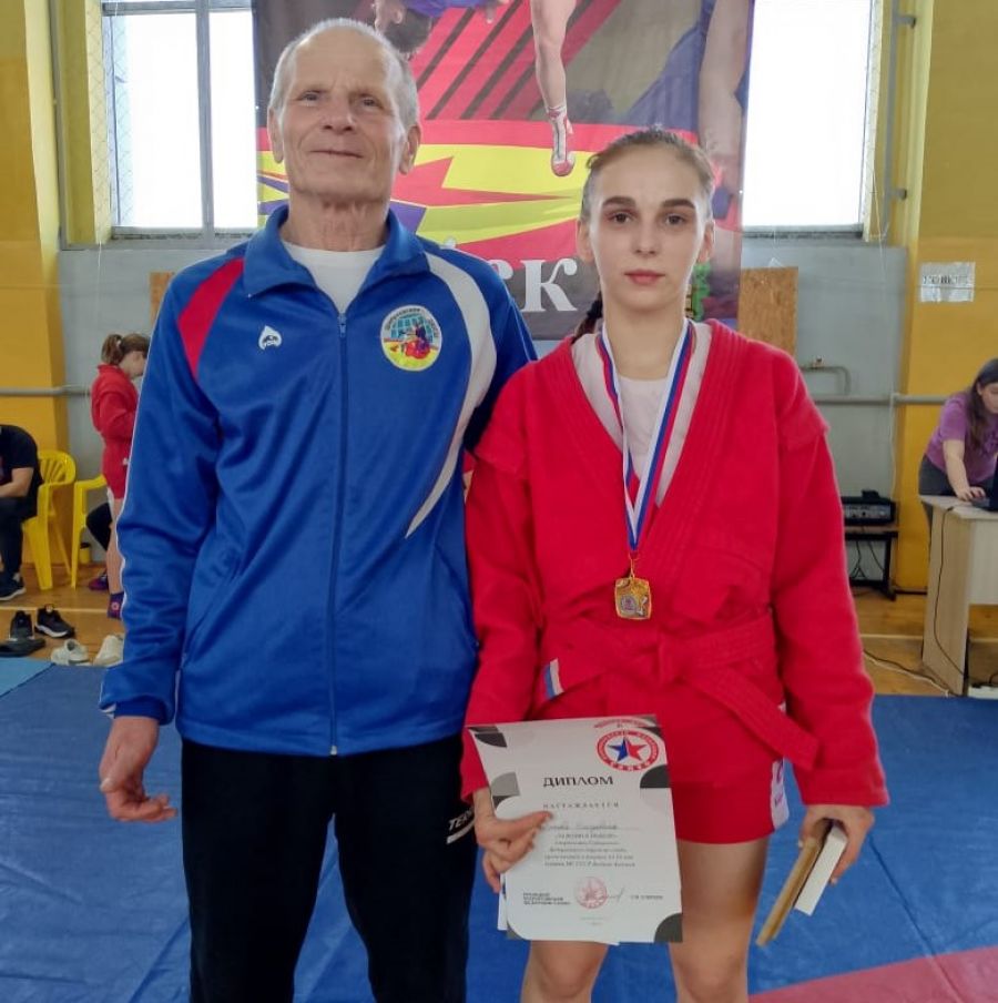 Елизавета Быкова с тренером Виктором Куликовым