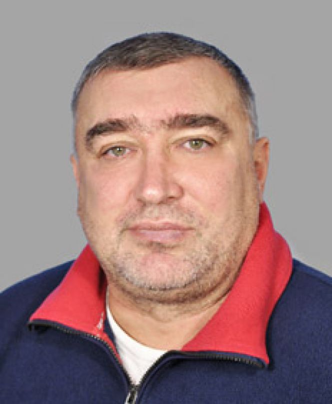 Тренер высшей категории Олег Долбешкин